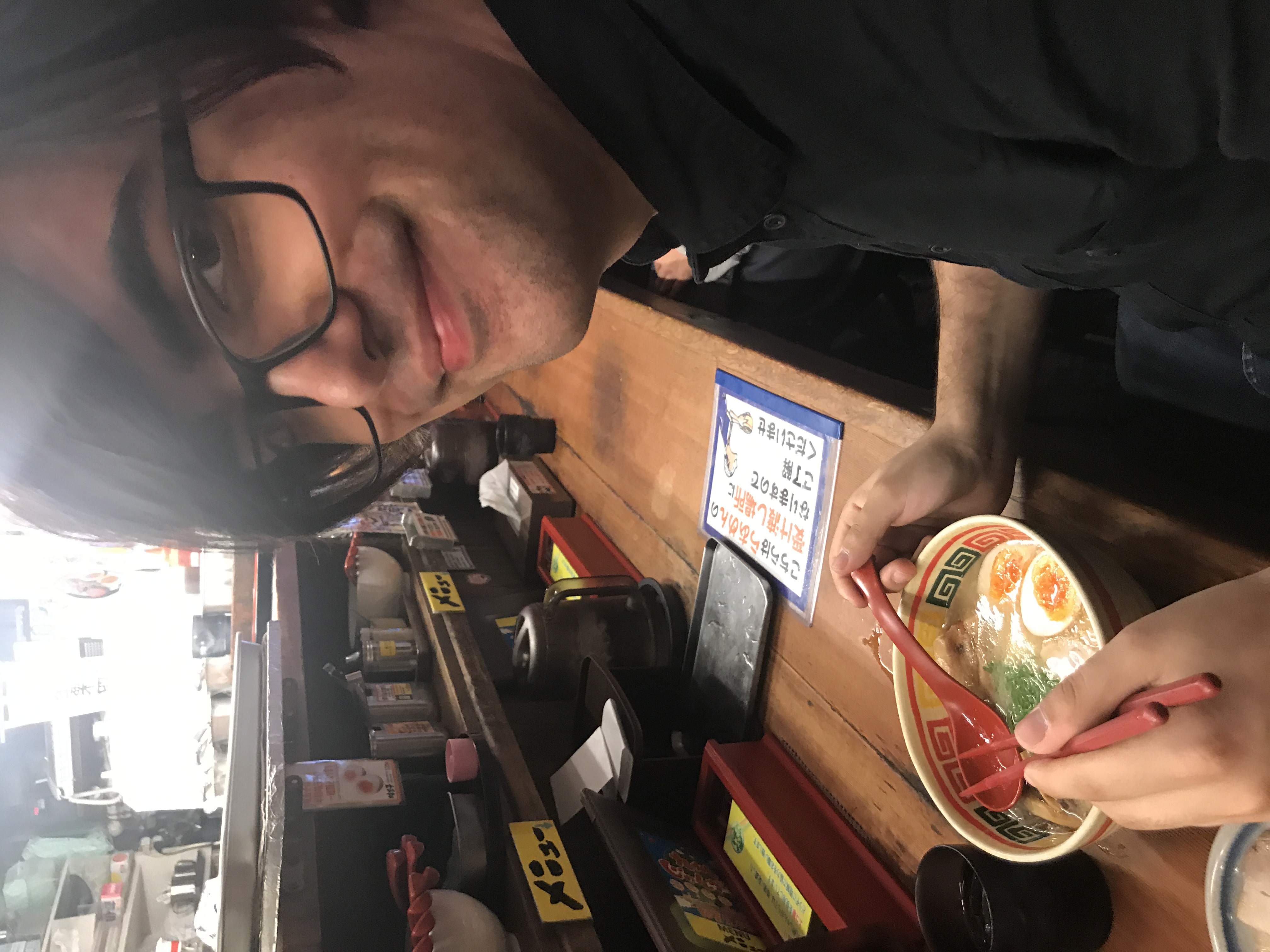Here's a random photo of me eating ramen during our last trip to Japan.
